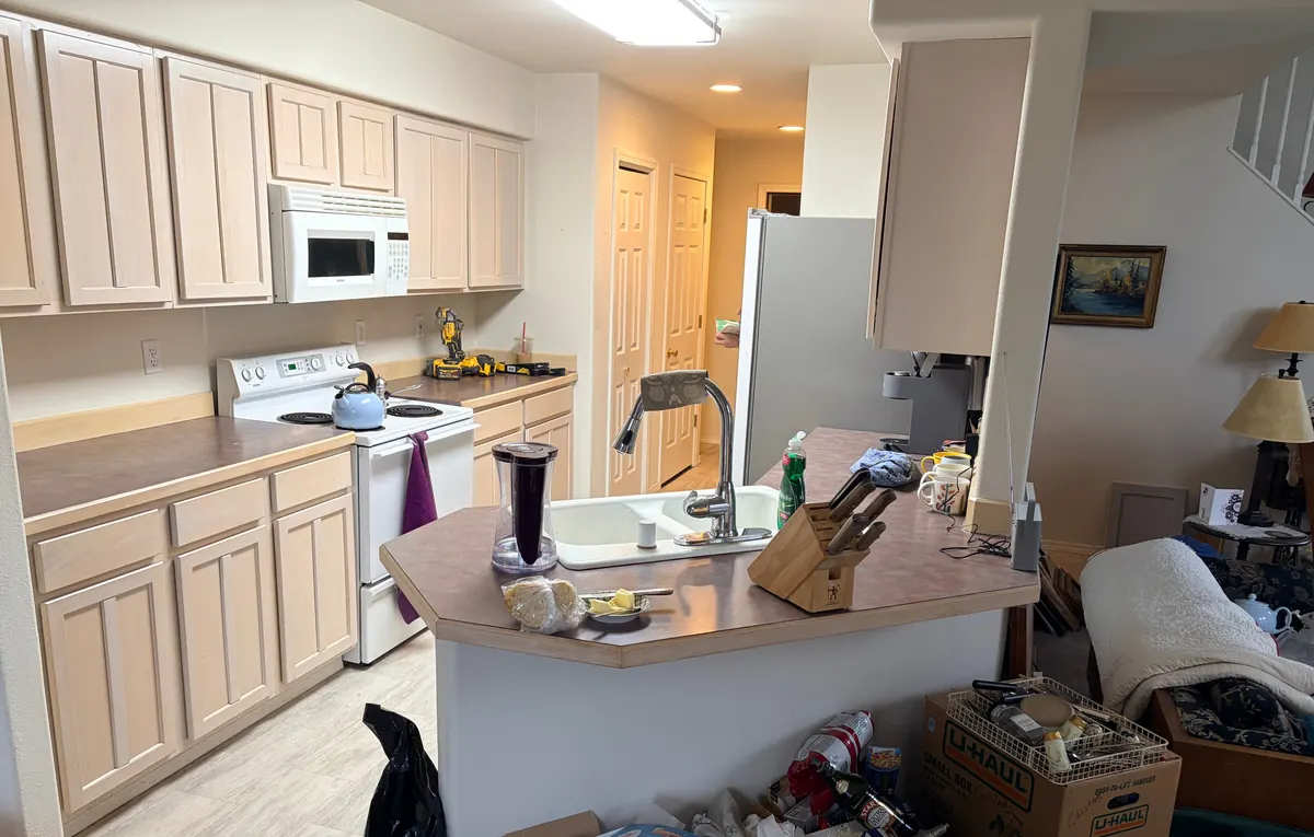 Condo galley kitchen gut — Turnagain — before